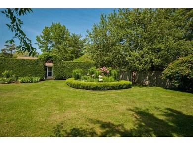 Yard/Garden. Guest House seen through garden hedge