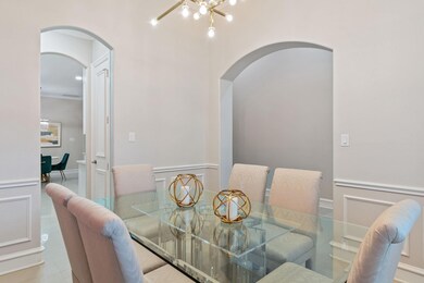 Dining room featuring a notable chandelier and orn