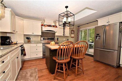 A KITCHEN VIEW WITH SLIDER TO DECK.