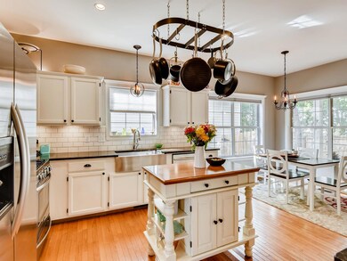 Eat-in dining off of kitchen.  Tailored cordless fabric shades let in lots of natural light.
