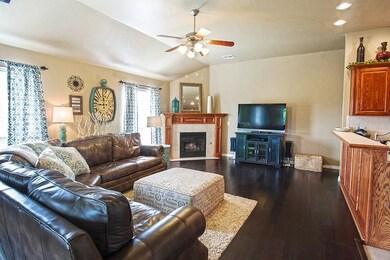 Corner gas log fireplace with electric start.