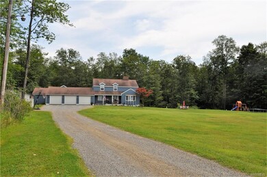 Front with view of huge yard