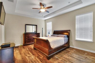 Master bedroom:  Upgraded laminate flooring.  Trey
