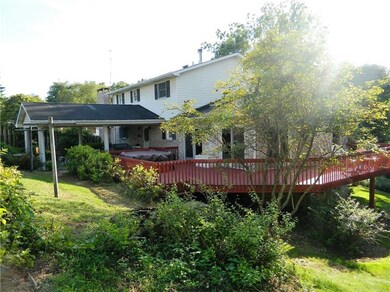 The covered cement patio and wrap around deck allo