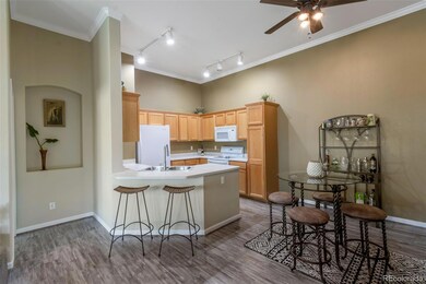 Casual bar top dining off kitchen.