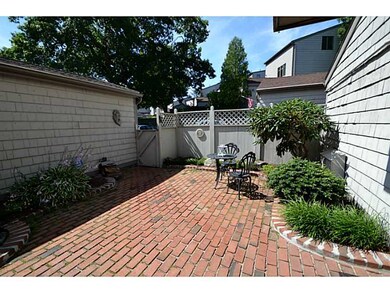 Exterior Front. Courtyard Entry