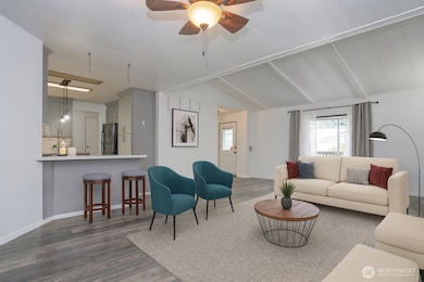 Step into this 1,248 SF home featuring new LVP flooring throughout the main living areas - Virtually staged to inspire your vision of the space.