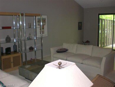 LIVING ROOM, VALTED AND OPEN TO THE DINING ROOM