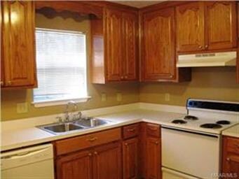 KITCHEN WITH VIEW OF BACKYARD