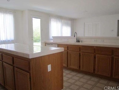 Kitchen looking out to family room.