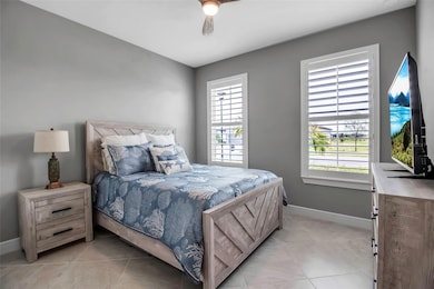 Bedroom #2 with Plantation shutters is in front of home