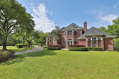 The home's corner location allows for a nicely set back structure and a gracefully curved circle drive.