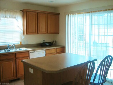 Kitchen View showing sliding door to patio