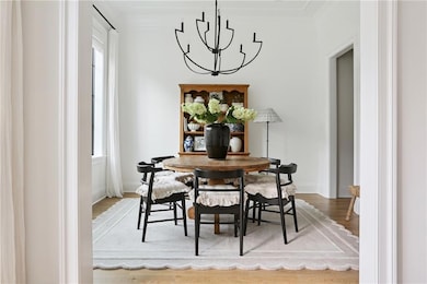 Dining room with custom millwork on ceiling