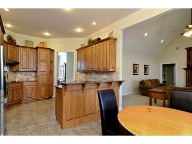 Kitchen. Nice open plan with breakfast bar!