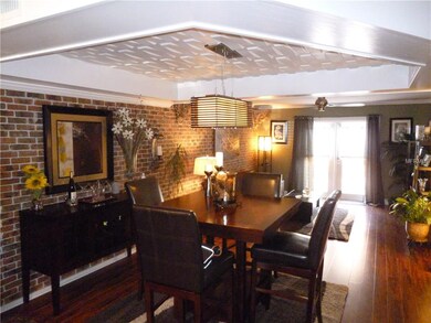 Dining Area with drop down ceiling, decorative cei