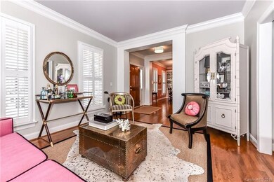Formal Living Room with beautiful crown molding an