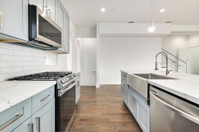 Kitchen featuring appliances with stainless steel 