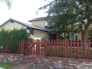 Fresh exterior paint, fenced in front yard