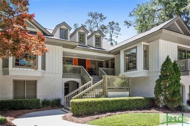 Triple dormers, bay windows and balconies compleme