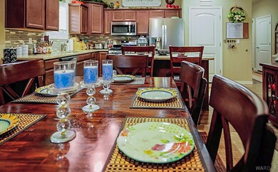 Dining area looking into kitchen
