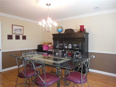 Enjoy the Dining Room.  Upgraded New Wood Floors. 