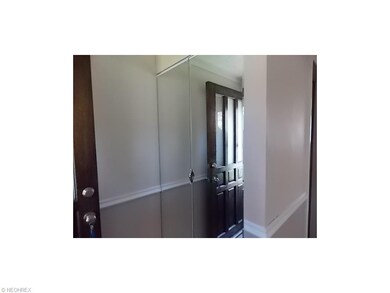 Mo=irrored foyer closet