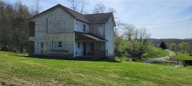 A side view of the house showing the front porch!