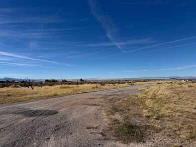 View of road with a view of rural / pastoral area and a mountain view