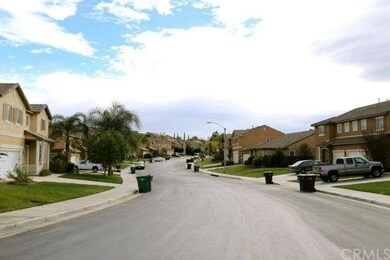 Looking down the street. (Ugh, it was trash day)