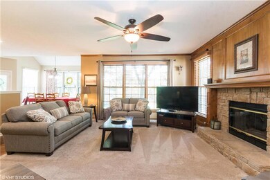 Bright and comfortable family room with gas firepl