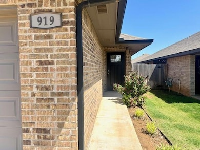 Property entrance with brick siding