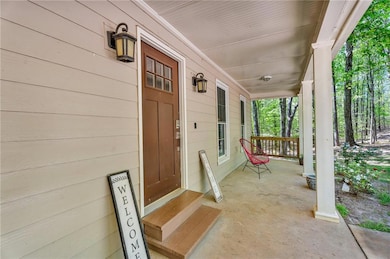 Entrance to property with a porch