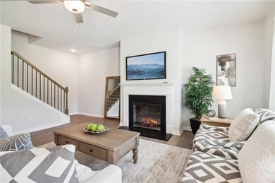 Living room featuring wood-type flooring and ceili