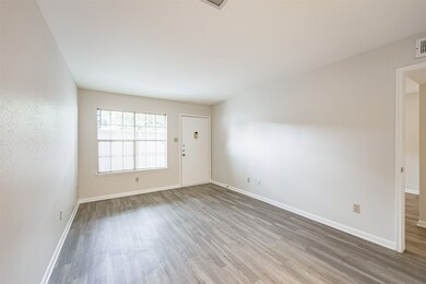 The living room is nice and bright with the large