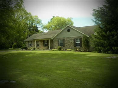 This all brick home is located at the end of a quiet cul-de-sac with an incredible yard.