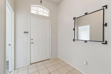 Entrance foyer with tile flooring