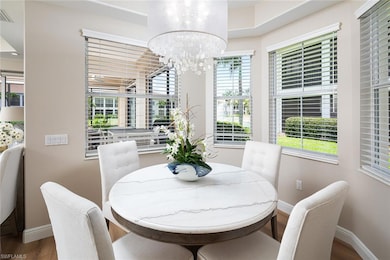 Dining room featuring a chandelier and wood finished floors