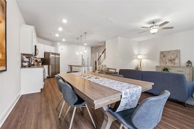 Dining room featuring dark hardwood / wood-style f