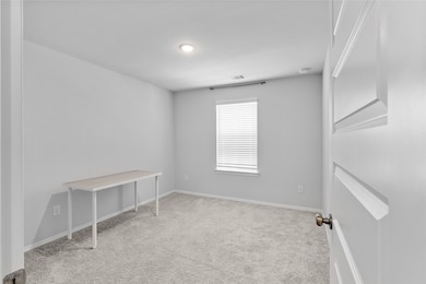 Bright and versatile room with neutral tones and c
