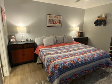 Bedroom featuring wood finished floors