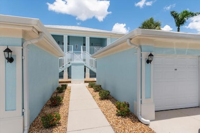 Private 1 car garage to the right, in front of unit