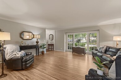 Cheerful Living Room with Original Hardwood Floors