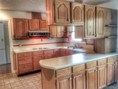 Abundant cabinet space / ceramic flooring and back