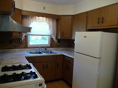Kitchen. Second view of U shaped kitchen.