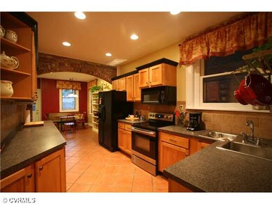 Kitchen - Natural finish maple cabinets, tile floo