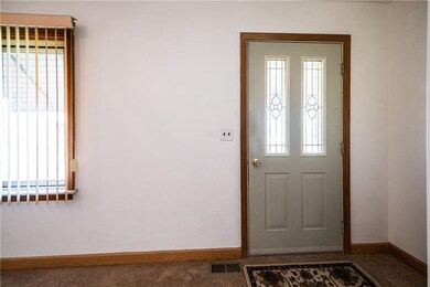 FRONT DOOR:  Pretty beveled glass door welcomes your guest as they come to your front door.