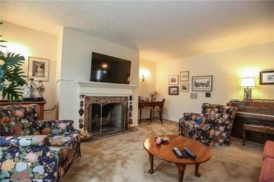 Warm and comfy living room with wood burning firep