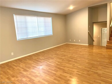 Living room that has been newly painted, and has h