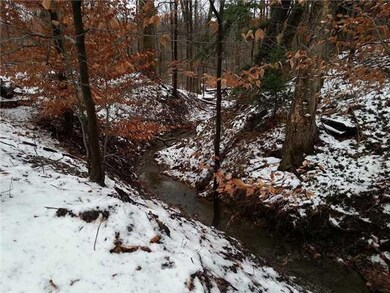 Land A small stream forms the east border of the p